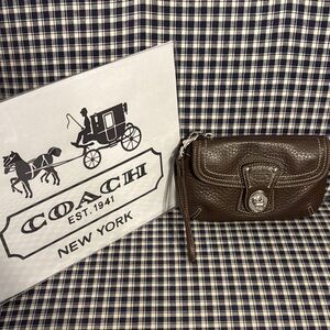 Coach Dark Brown pebbled Leather turnlock Wristlet